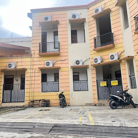 Oyo 93380 Penginapan Mangkoe Barokah Tanah Grogot Buitenkant foto