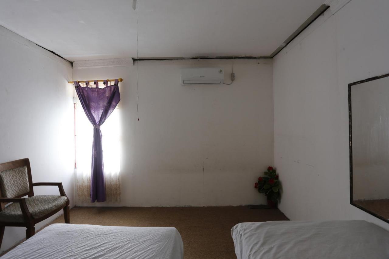 Oyo 93380 Penginapan Mangkoe Barokah Tanah Grogot Buitenkant foto