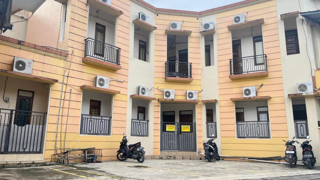 Oyo 93380 Penginapan Mangkoe Barokah Tanah Grogot Buitenkant foto